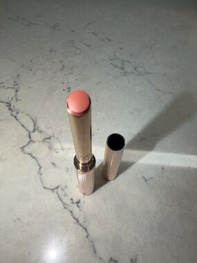 Pure Color Explicit Slick Shine Lipstick in the shade Out of Time (0.02 oz.),